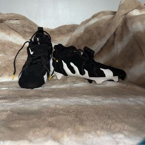 Nike Black and White Cleats with Yellow Accents